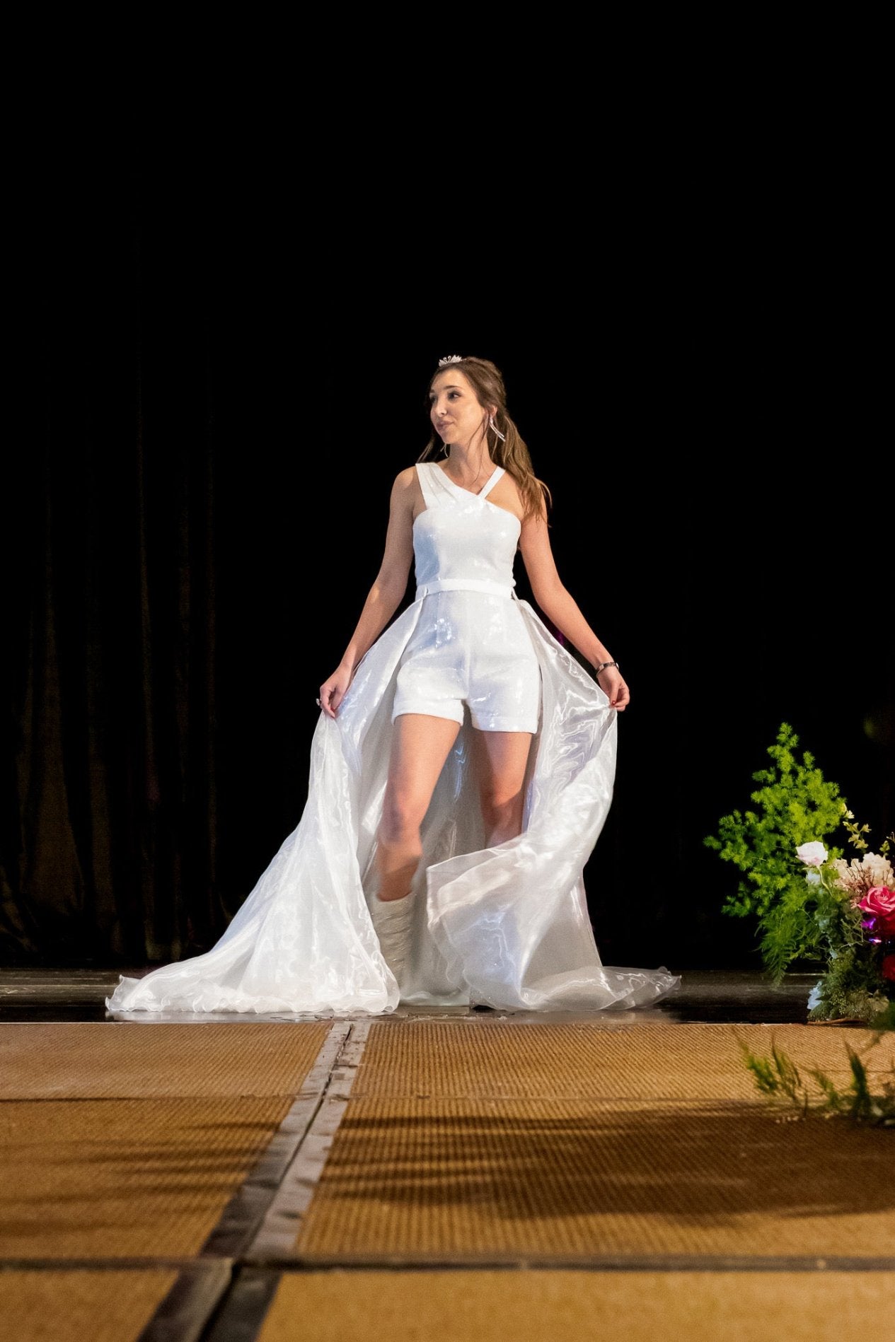 Off -White sequin romper with bodice/shoulder details, cuffed on the thighs, comes with a detachable skirt for a more dramatic look.