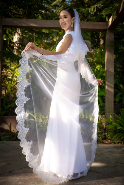 Elegant Scalloped Collar Neckline, Scalloped belt, Satin covered buttons down the back in White Satin--Fitted&nbsp; with a Mermaid Flair Hemline...